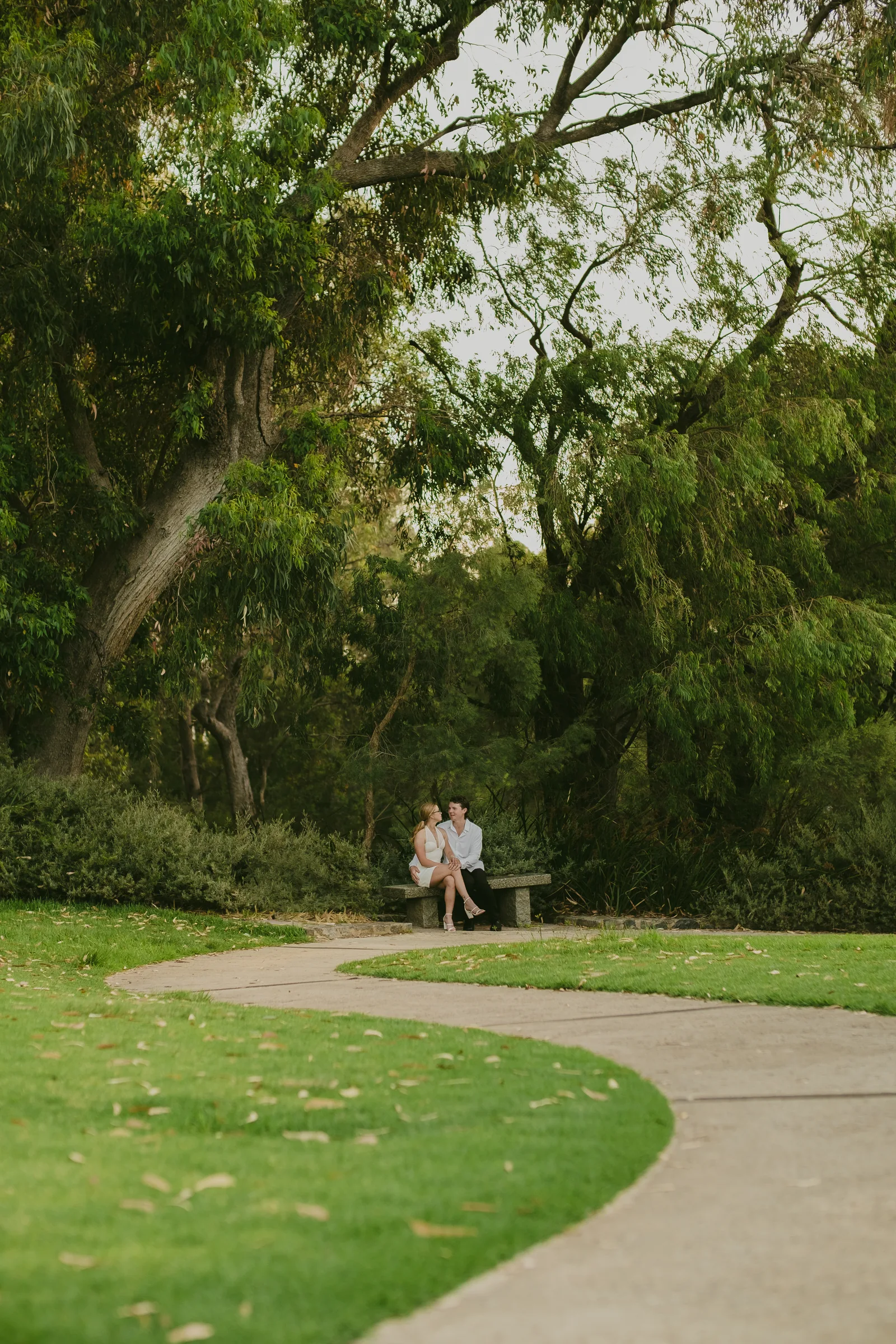 Quiet, empty pathway through Kings Park at dusk after the pre-wedding session