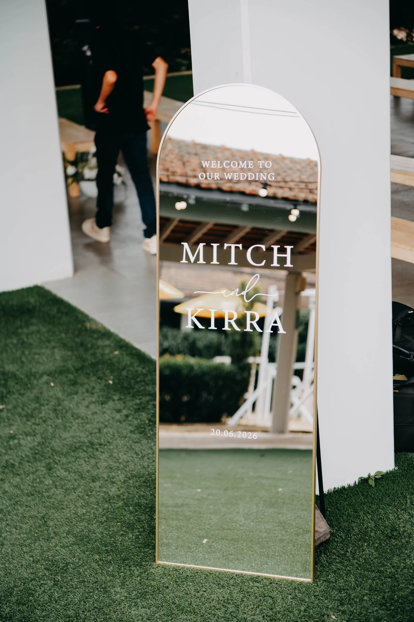Welcome sign for Kirra and Mitch's wedding ceremony at the Garden Pavilion, The Vines Resort