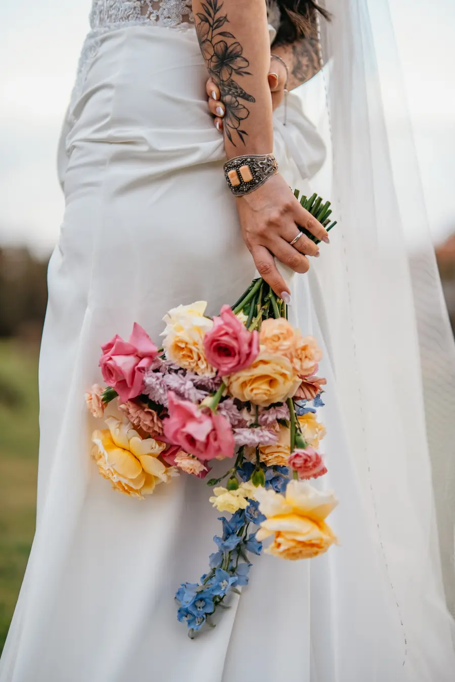 Close portrait of Kerry and Richard smiling together at their Vines Resort wedding