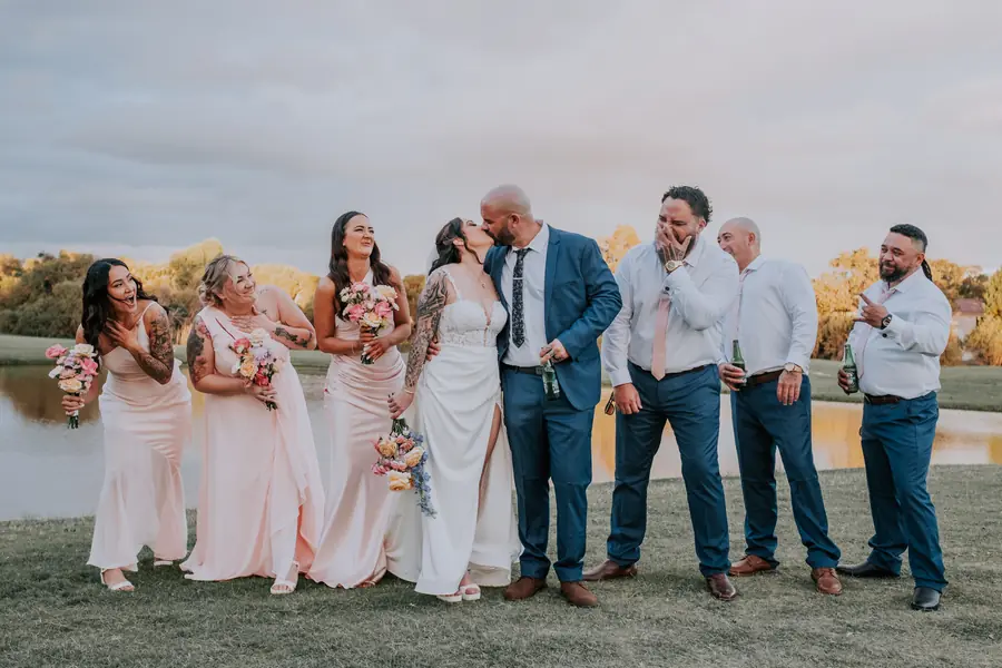Bridal party celebrating with the newlyweds on the golf course at The Vines Resort, Perth wedding videography