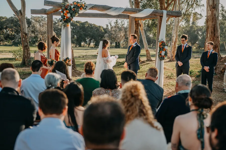 Bride reading her vows to the groom during their ceremony at The Barn, Hopeland