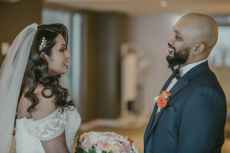 Jibin sharing a quiet moment with his groomsman before the ceremony